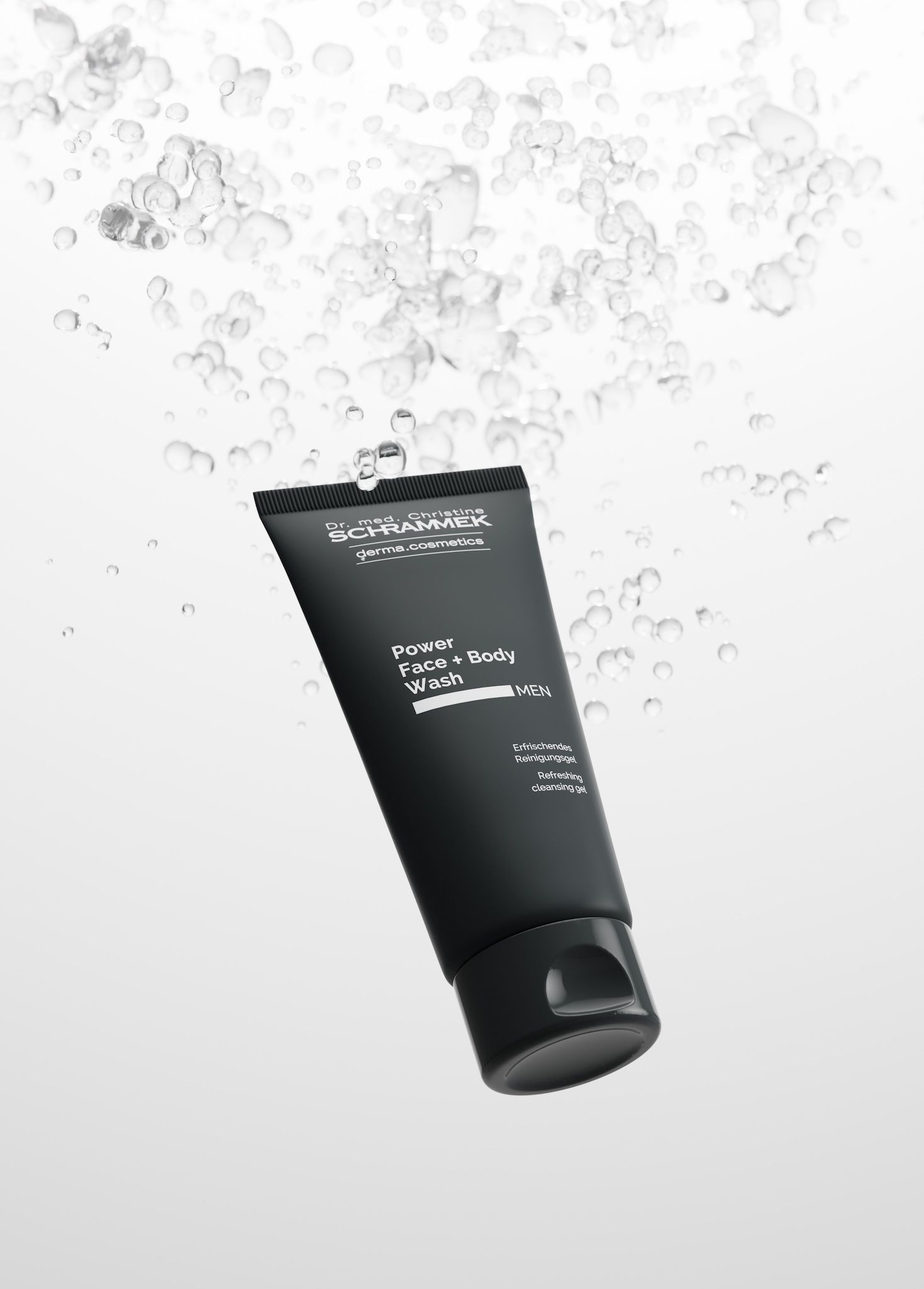 Dr. Schrammek Power Face + Body Wash MEN black tube surrounded by water droplets, AI-generated with loomobox