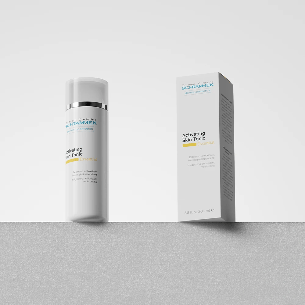 Dr. Schrammek Activating Skin Tonic bottle beside its carton in a minimalist grey studio — render created with loomobox
