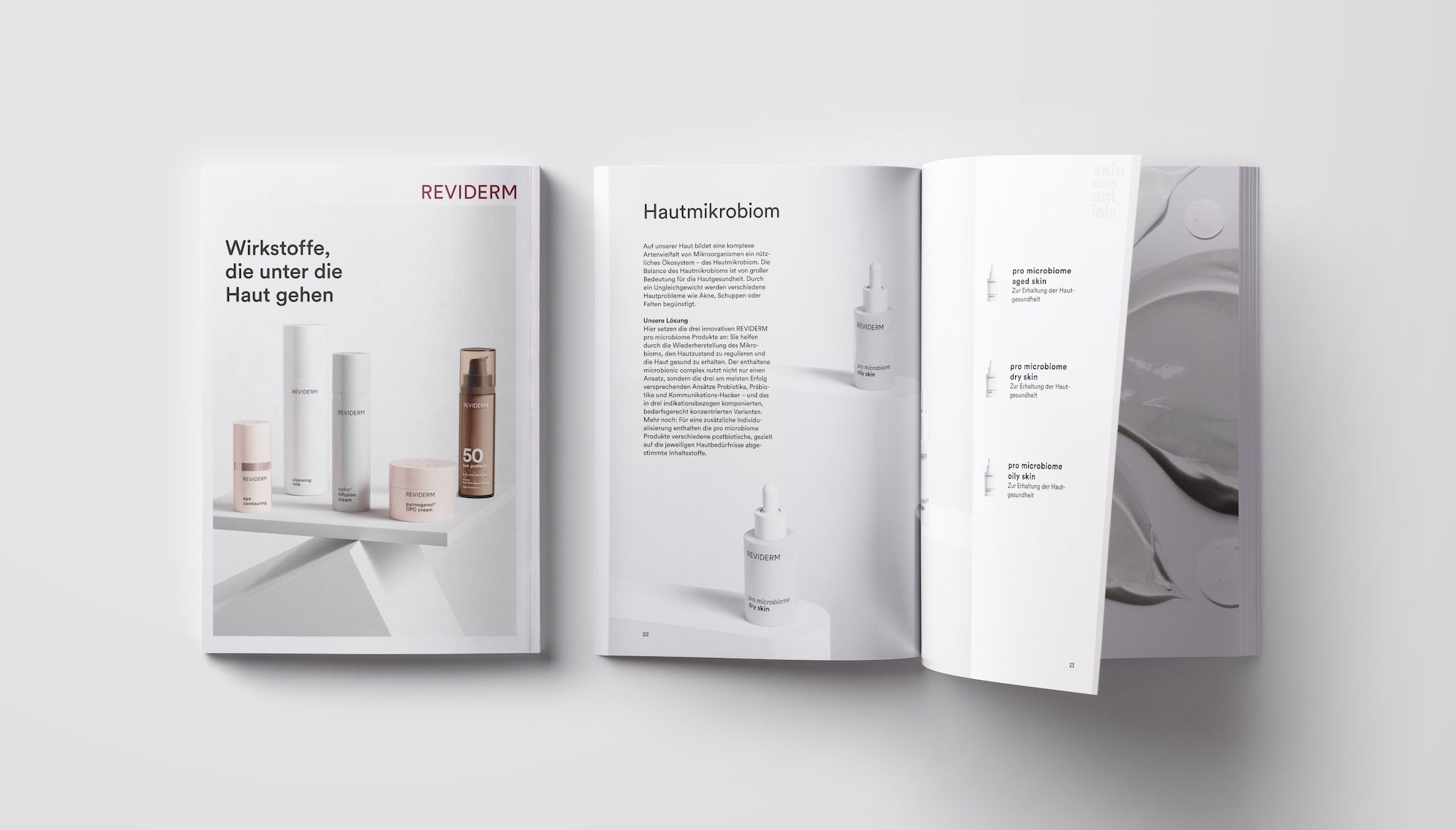 Open magazine mockup showing a REVIDERM suncare editorial spread with the product range on a brown background