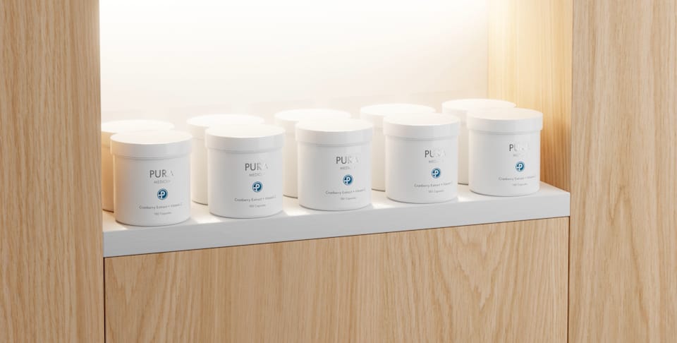 White PURA Medicus supplement jars lined up on a backlit wooden shelf — retail-style 3D scene generated with loomobox