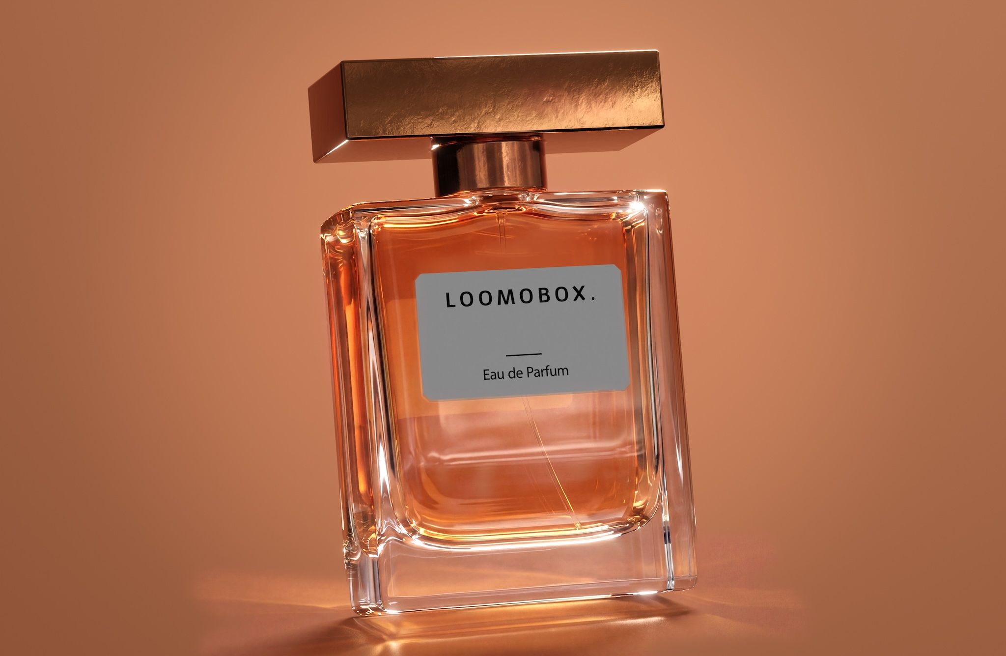 Amber eau de parfum flacon with gold cap in warm light — photorealistic fragrance render created with loomobox